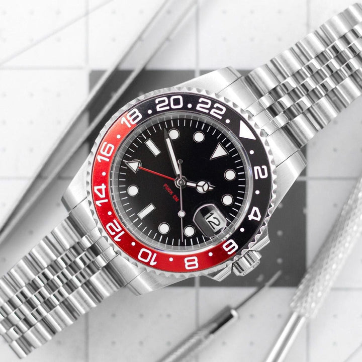 F Em Pop GMT - Chrono Canada